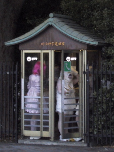 People in a phone booth