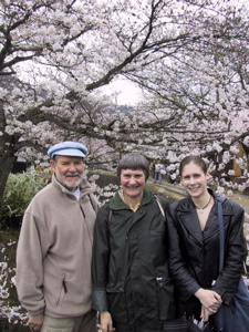 The family and a cherry tree