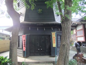 Kanayama Shrine, with a large metal penis visible to the right