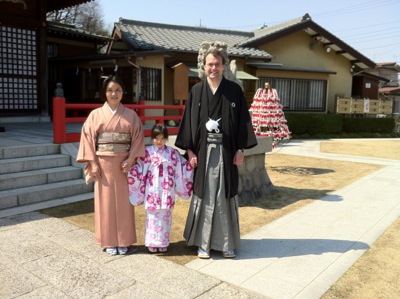 Me and my family, all in kimonos, at a jinja.