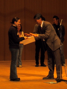 Rachel receiving her prize